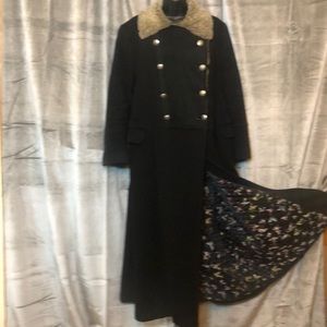 Wool coat with shearling insert
